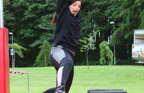 Lady on monkey bars'
